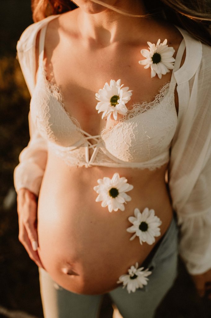 pregnant belly with flowers