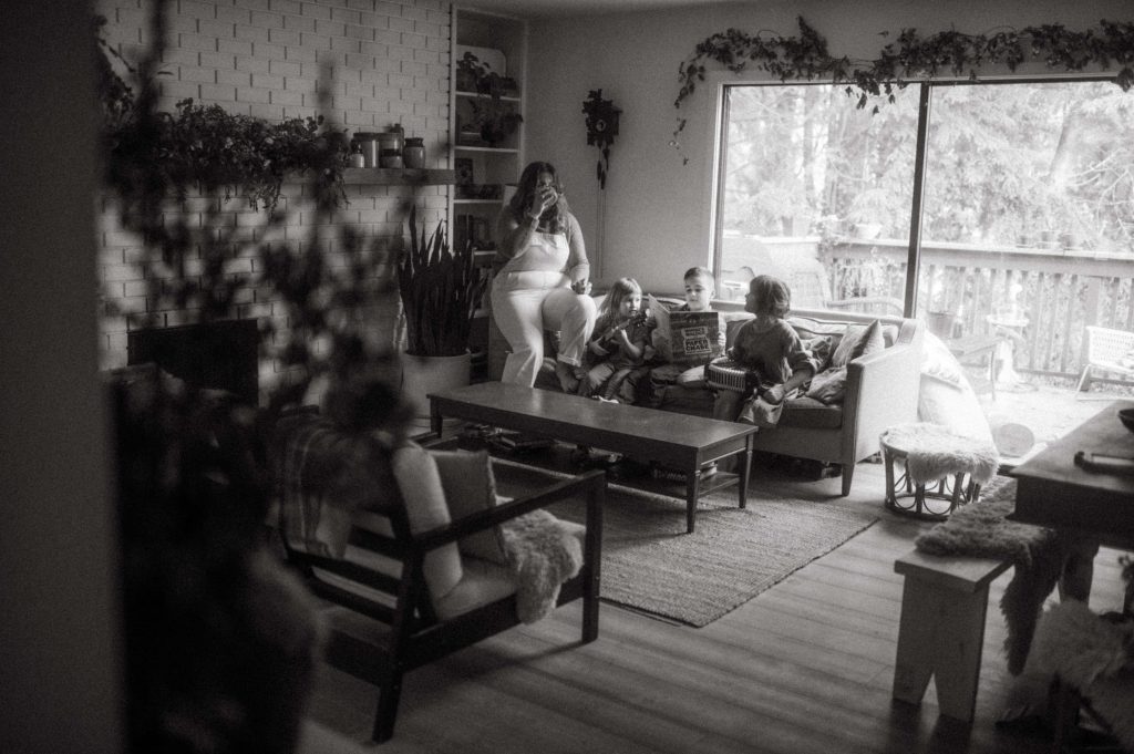 family sitting in living room