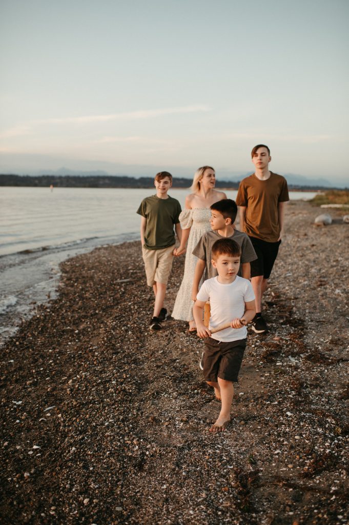 family walking on beach blackie spit park, best photography locations