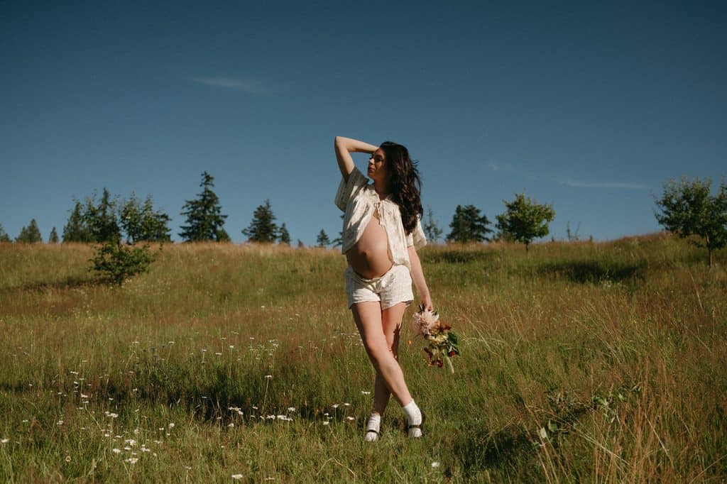 Grassy field Maternity Session editorial styling